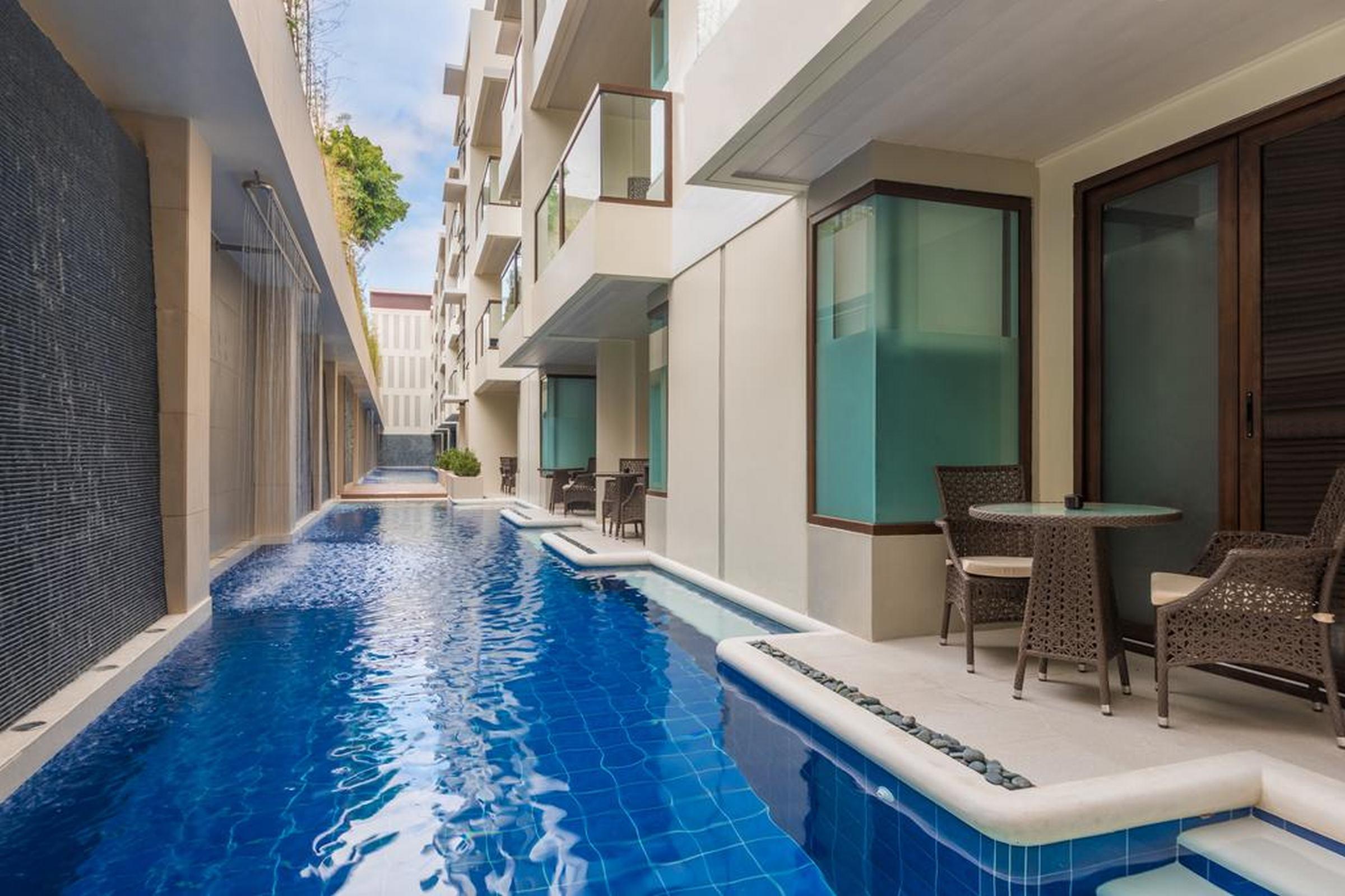 Henann Prime Beach Resort Balabag  Exterior photo Swim-up rooms at the Hard Rock Hotel